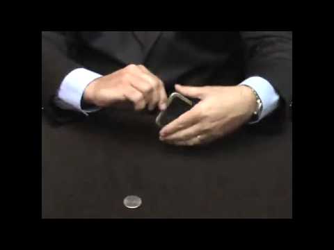 Slippery Expanded Shell Walking Liberty (w/DVD) (D0134) by Tango - www.MJMMagic.com