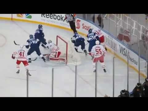 Jake Gardiner (51) carries the puck up ice leading to good scoring chance