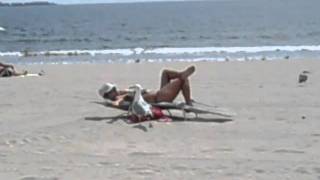 preview picture of video 'Hot Revere Beach girl showing off, hand feeding a seagull'