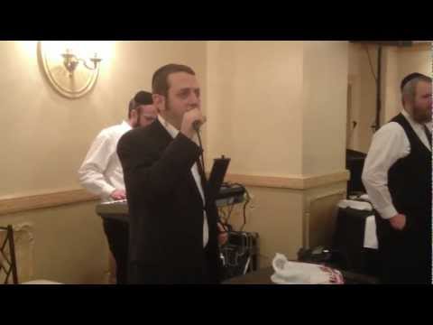 Srully green singing Ki chol peh at a wedding w/yossi rosenfeld on the keys