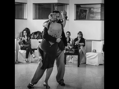  Rino Fraina  and  Graziella Pulvirenti  are  dancing  to  "  No Me Extrana  "  by  Pedro Laurenz  at  Cosenza tango festival