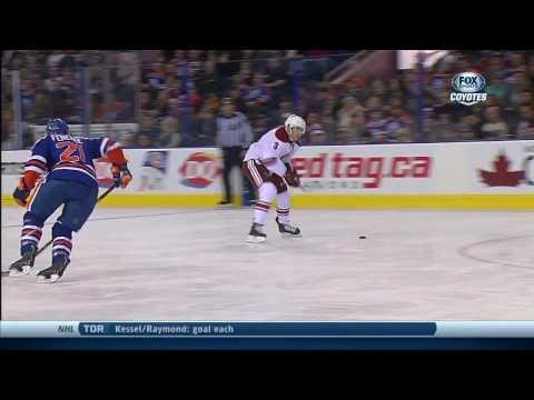 Keith Yandle dekes and scores on Dubnyk