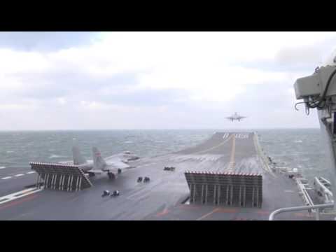 Chinese aircraft carrier Liaoning carries out drill with J-15 jets on board