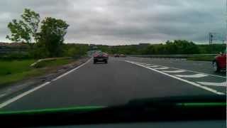 preview picture of video 'DashCam - Mini Cooper Tries to Send Car Off of Bridge'