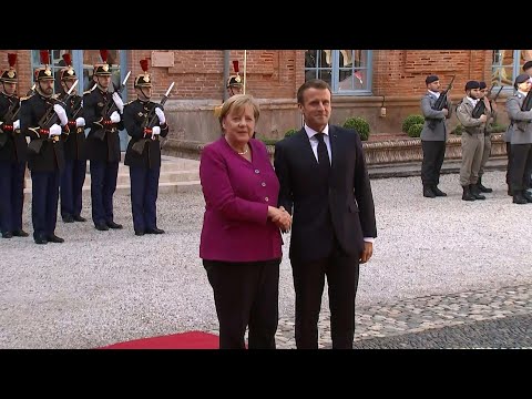 Macron, Merkel in Toulouse for Franco-German council | AFP