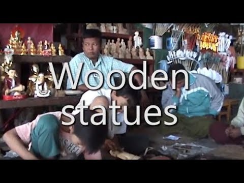 Carving wooden buddha statues