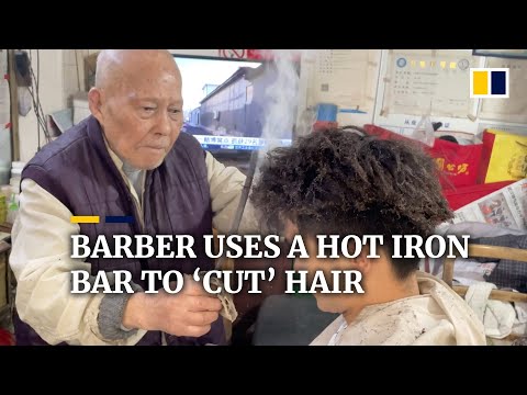 This Chinese barber uses a hot iron bar to ‘cut’ hair