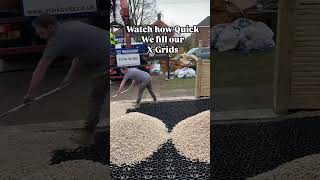 Watch us fill our X-grid gravel driveway system. #driveway #diy #renovation #fyp #viralvideo