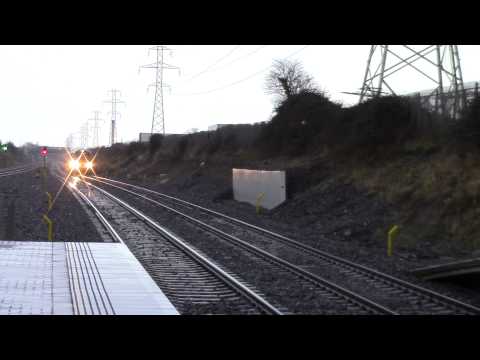 Irish Rail 22000 DMU 22018 passes Park West and Cherry Orchard going to Galway