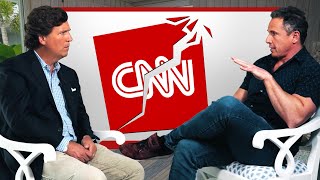 Tucker Carlson and Chris Cuomo Debate Trump, Abortion, and COVID Lies