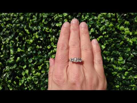 A fine 1.75 carat three stone diamond ring