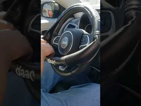 Speed Grip Steering Wheel Cover with Jeep Logo; Black Installation