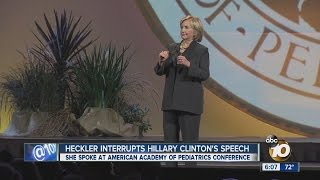 Heckler interrupts Hillary Clintons speech at Amer