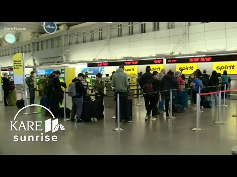 Quiet morning at MSP Airport amid snow, Thanksgiving travel