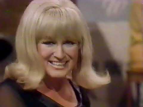 Jo Ann Castle and Neil LeVang with Flowers on the Wall.