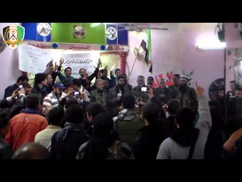 انشودة بصوت أحد عناصر الجيش الحر في مدينة دركوش في ريف إدلب في حفل تخريج الدفعة الثانية من السرية الطبية بحضور العقيد عبد الجبار العكيدي والعقيد عفيف سليمان