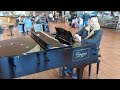 Michał Cholewiński plays Chuck Berry you never can tell & Boogie Woogie medly  at Bergamo Airport.