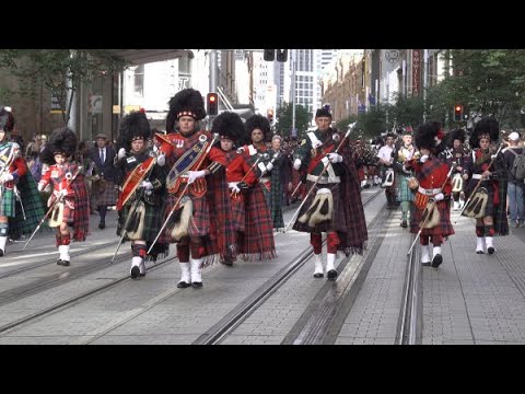 MASSED PIPE BANDS RETURN TO THE CENOTAPH ANZAC DAY 2023