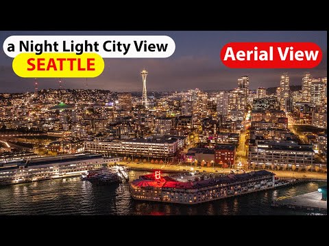 Seattle Downtown Nighttime view - flying around the waterfront area - aerial video view