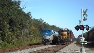 preview picture of video 'Amtrak Train Silver Star Passes CSX Train Making Pick Ups'