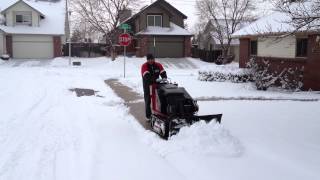 Toro Dingo 413 with 36' blade plowing snow