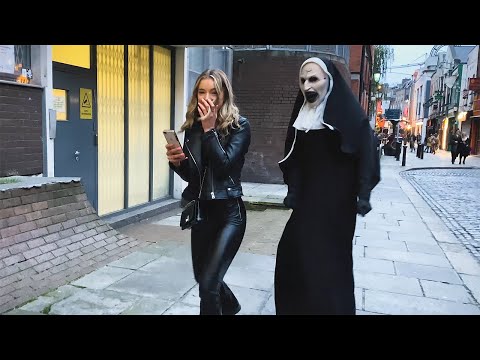 She has no Idea what's  behind Her. Craziest Reactions. The Nun Prank