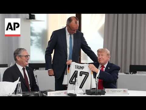 German chancellor Merz gives Trump a number 47 soccer jersey at G7 summit