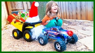 Dump Truck O'Claus and Rednosed Monster Truck Deliver Christmas Presents