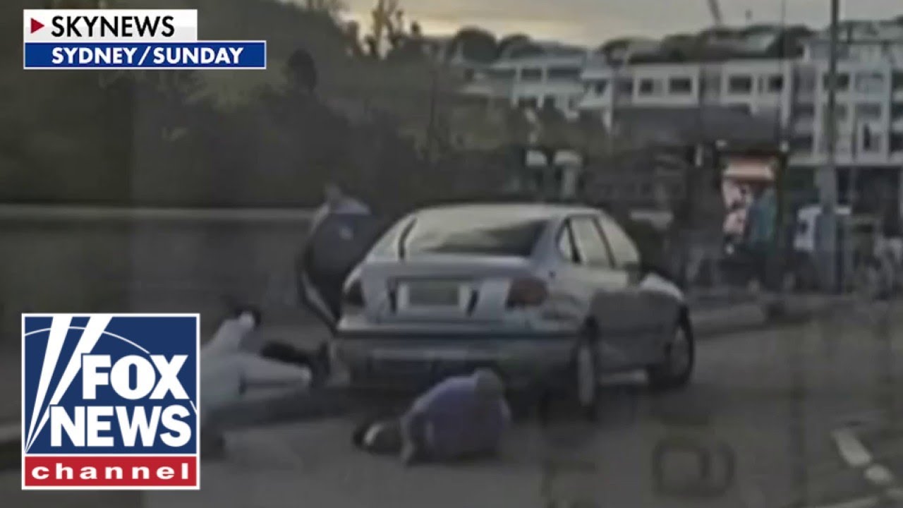 JARRING footage shows civilians trying to disarm Australia terror suspects