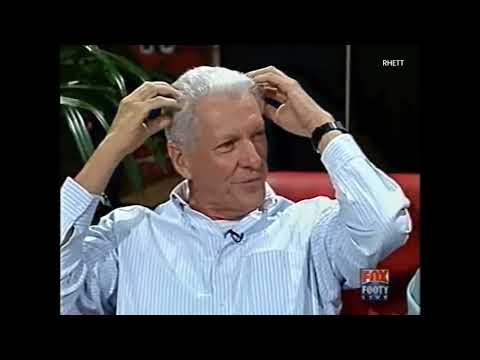 While Peter Landy tells a story about Peter Hudson; John Barnes grabs a beer