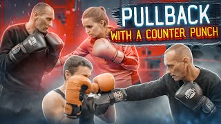 Brilliant combination of shoulder defense with a counter punch