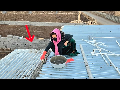 Narges alone did the cement work on the roof of the hut in Mustafa's absence.