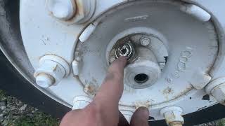 How to change oil in a axle of a Freightliner MT45