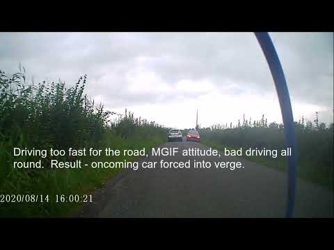 MGIF - Passes Cyclist, Near Collision - AD06OET AD06 OET