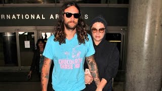 Kesha Clings To Boyfriend Brad Ashenfelter At LAX After Romantic Vacation