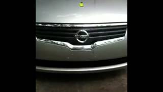 Plug holes in bumper cover where license plate goes