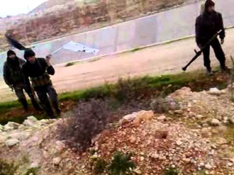 جولة ميدانية مع مقاتلي كتائب الإسلام في محيط مدرسة الشرطة في ريف حلب الغربي بعد السيطرة عليها من قبل فصائل الجيش الحر