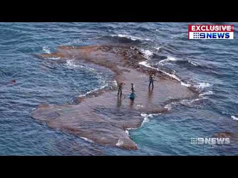Video: Teens come inches from death as six sharks circle them