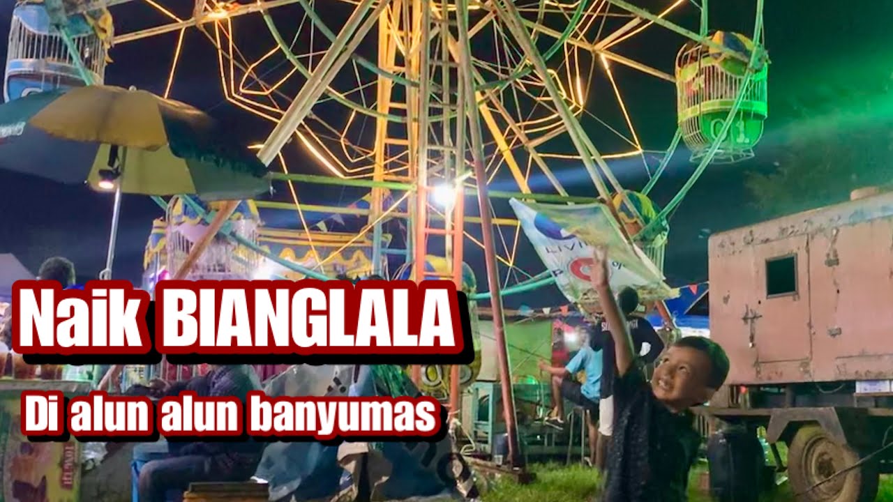 Naik bianglala di pasar malam alun alun banyumas