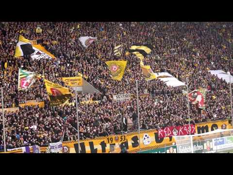 Dynamo Dresden fans chanting "Dy Dy Dy na na na mo mo mo" against Erzgebirge Aue