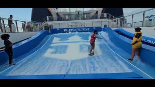 My most fave dismount (at the end) Stand Up Surfing on the Flowrider on Ovation of the Seas 04/2023