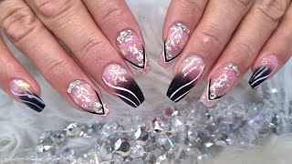 New Year nails for my client. Glitter encapsulation with black ombre and line work. Gel rebalance 