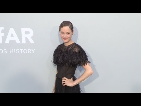Jordan Barrett, Evie Harris, Vicky Krieps at the Photocall for the amfAR party in Antibes