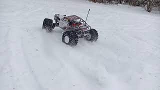 Traxxas TRX4 on 4s in the snow.