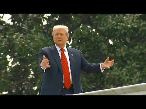 Trump surveys White House grounds from rooftop | AFP