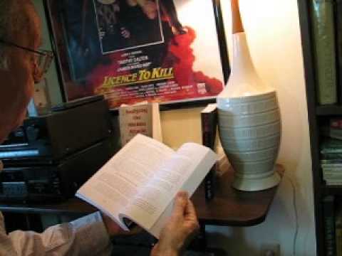 Ed Lake examing first "proof" copies of "A Crime Unlike Any Other"