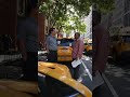 Two New York City Cab Drivers Talking and Drinking Coffee
