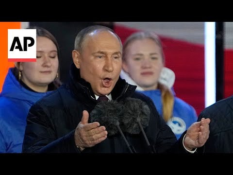 Putin attends concert in Moscow on Crimea's annexation anniversary