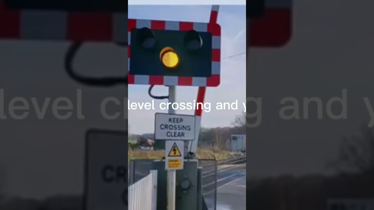 Watch video Level crossing/steady amber light/warning sign/train is approaching Now Level crossing/steady amber light/warning sign/train is approaching