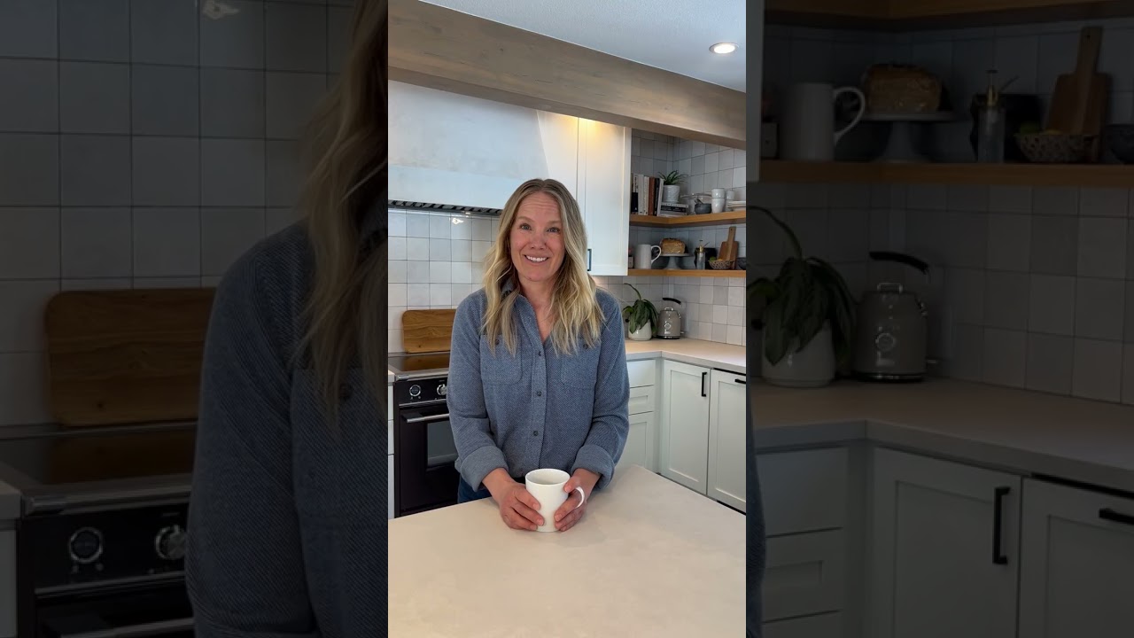 Lisa Fligor, registered dietitian at Tahoe Forest Health System, standing in a kitchen holding a coffee mug